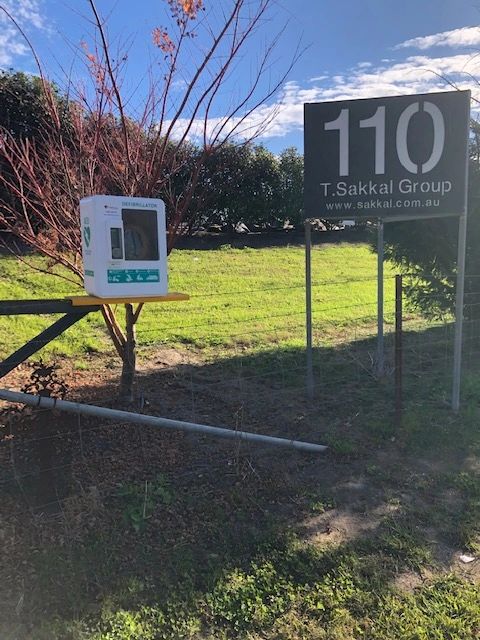AED 111 installed beside the 110 Cattai Ridge Road sign