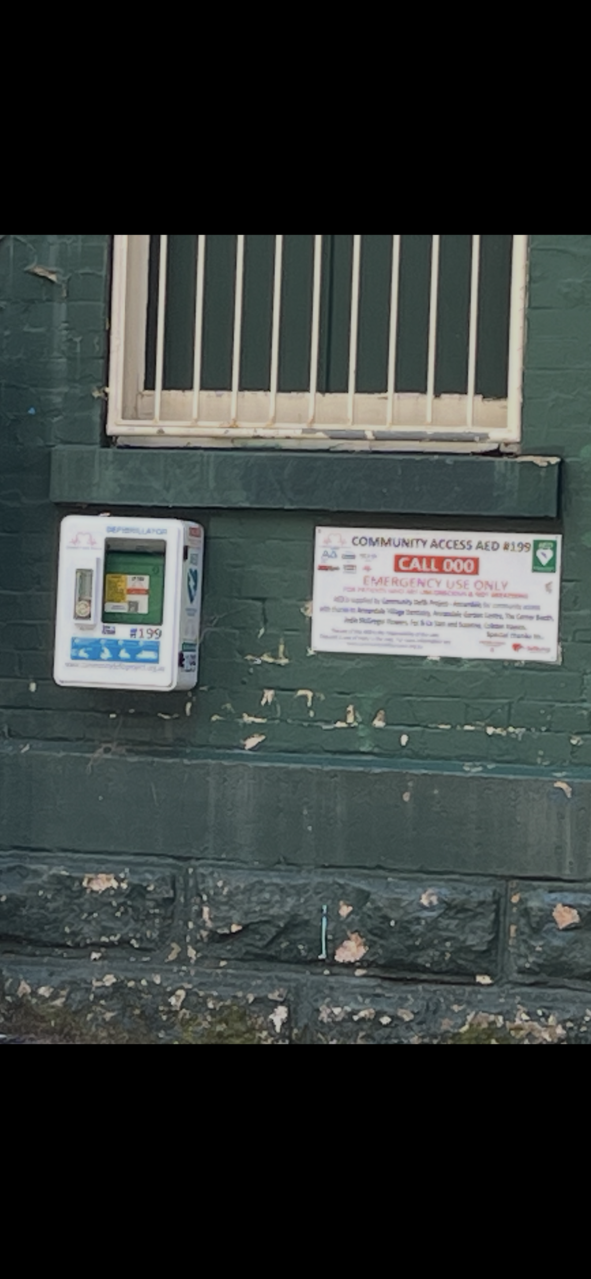 AED 199 cabinet and community access signage in Annandale